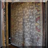 R55. Handcrafted rug with rose border.